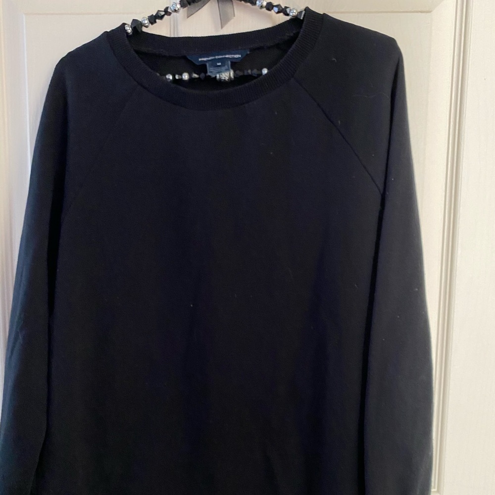 French connection black sweater with sheer back.